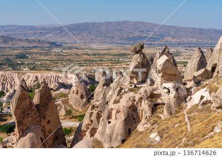 Volcanic rock formations landscape in Cappadocia, place of residence of ancient Christians 136714626