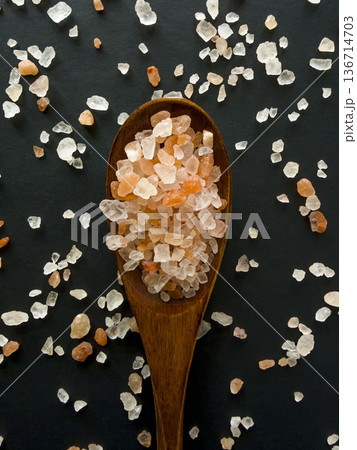 Pink Himalayan Salt Crystals on Wooden Spoon Flat Lay 136714703