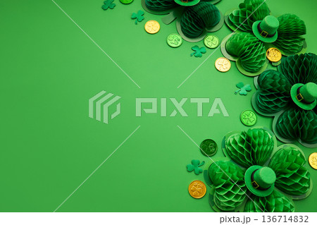 Celebrating st. Patrick's day with green shamrocks and gold coins 136714832