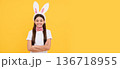 happy easter teen girl in bunny ears and bow tie. Easter child horizontal poster. Web banner header of bunny kid, copy space. 136718955