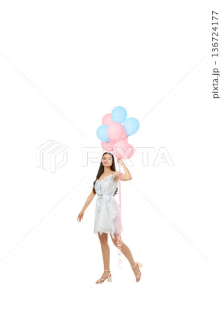 Joyful woman in white dress with balloons, isolated on white, PNG 136724177
