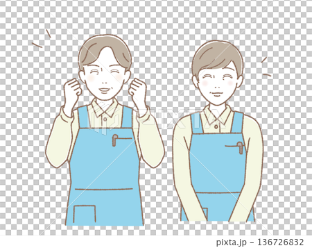 エプロン姿で笑顔の中高年男女ペア ガッツポーズと微笑み 介護・医療・福祉 136726832