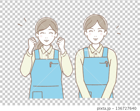 エプロン姿で笑顔の若い男女ペア ガッツポーズと微笑み 介護・家事代行・医療スタッフ 136727640