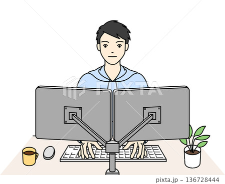 デュアルモニターでパソコン作業に集中する男性エンジニア 136728444