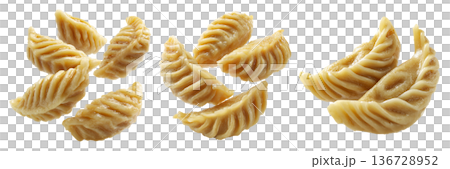 Set of Steamed Banana dumplings with intricate twisted edges, isolated on white background. Concept of Asian cuisine and food art 136728952