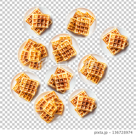 Multiple plates of golden waffles with creamy topping isolated on white background, concept of delicious breakfast food 136728974