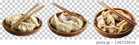 Pan-fried or steamed dumplings Jiaoz arranged on a wooden plate, isolated on white background, concept of Asian cuisine Pan-fried or steamed dumplings Jiaoz arranged on a wooden plate, isolated on white background, concept of Asian cuisine 136729016