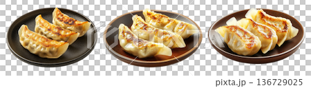 Golden pan-fried Japanese gyoza dumplings served on plate, isolated on white background, concept of Asian cuisine Golden pan-fried Japanese gyoza dumplings served on plate, isolated on white background, concept of Asian cuisine 136729025