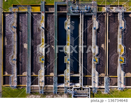 Water treatment facility with multiple treatment channels and structures in operation during daylight hours Water treatment facility with multiple treatment channels and structures in operation during daylight hours 136734648
