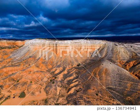 Canyon view with rocky terrain and cloudy sky during afternoon Canyon view with rocky terrain and cloudy sky during afternoon 136734941