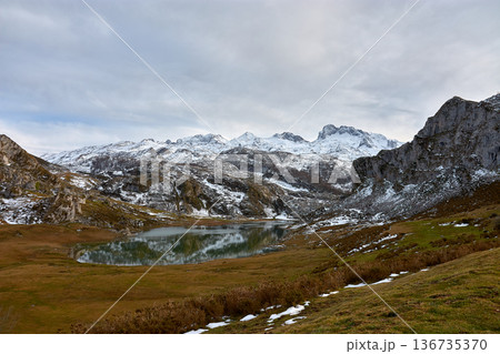 Breathtaking landscape of Lake Ercina with snowy mountains in Asturias, northern Spain 136735370