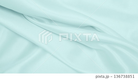 Smooth elegant blue silk or satin luxury cloth texture as abstract background. Luxurious background design 136738851
