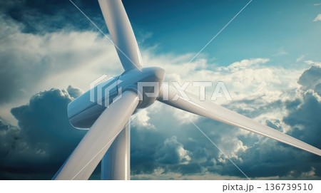Close up of wind turbine rotor blades against blue sky with clouds renewable energy concept Close up of wind turbine rotor blades against blue sky with clouds renewable energy concept 136739510