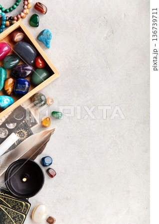 Healing Crystals, Tarot Cards, and Candle on Spiritual Altar Healing Crystals, Tarot Cards, and Candle on Spiritual Altar 136739711