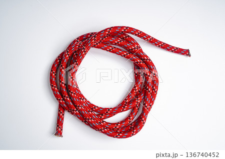 a red rope rolled up 136740452