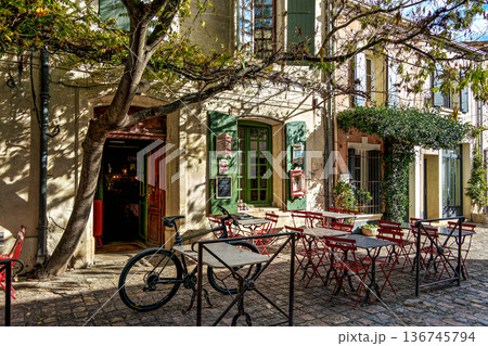 Aigues Mortes, France - Nov 05, 2025: The houses of the historic city center of Aigues-Mortes in France 136745794