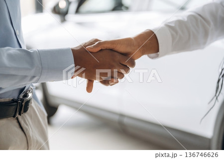 Handshake, close up view of people's hands, business deal 136746626
