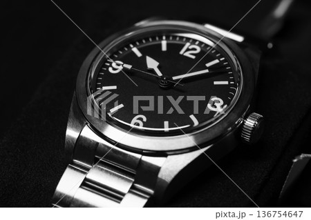 Stainless steel wristwatch with a minimalist black dial Stainless steel wristwatch with a minimalist black dial 136754647