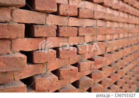 Textured Red Brick Wall Pattern Background Textured Red Brick Wall Pattern Background 136755327