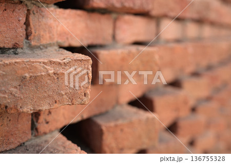 Textured Red Brick Wall Pattern Background Textured Red Brick Wall Pattern Background 136755328