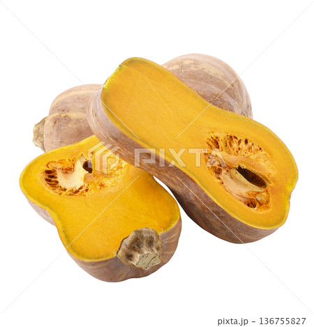 Pumpkin Butternut Squash Cut into pieces isolated on a white background Pumpkin Butternut Squash Cut into pieces isolated on a white background 136755827