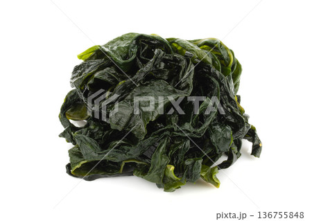 Kombu kelp is a large brown algae seaweed isolated on a white background 136755848