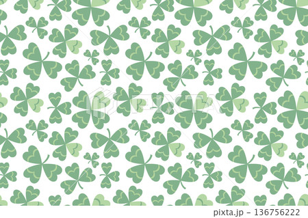 Seamless pattern with clover leaves. A symbol of good luck and prosperity. Green plant ornament for fabric, cards, and typography. Seamless pattern with clover leaves. A symbol of good luck and prosperity. Green plant ornament for fabric, cards, and typography. 136756222