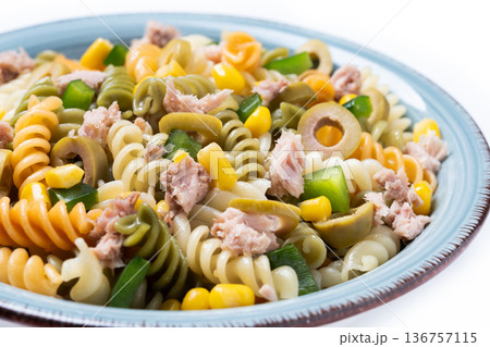 Pasta salad with tuna, corn and olives in bowl 136757115