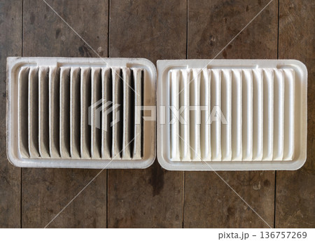 Comparison of Dirty and New Car Air Filters. Comparison of Dirty and New Car Air Filters. 136757269