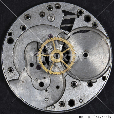 old clockwork, metal gears close up old clockwork, metal gears close up 136758215