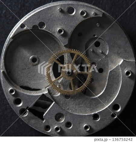 old clockwork, metal gears close up old clockwork, metal gears close up 136758242