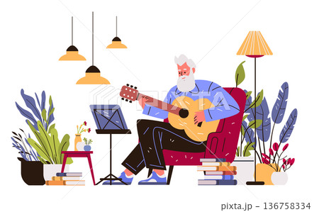 Senior man playing guitar music hobby home cozy interior plants books lamps armchair leisure activity active aging concept 136758334