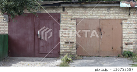 old metal warehouse door, hangar 136758587