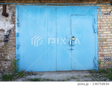 old metal warehouse door, hangar old metal warehouse door, hangar 136758630
