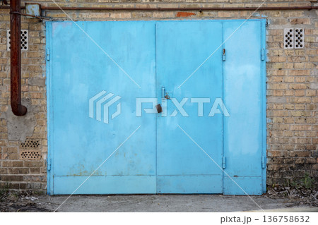 old metal warehouse door, hangar old metal warehouse door, hangar 136758632