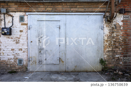 old metal warehouse door, hangar old metal warehouse door, hangar 136758639