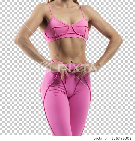 Athletic woman posing in pink sports bra and leggings with transparent background Athletic woman posing in pink sports bra and leggings with transparent background 136759302