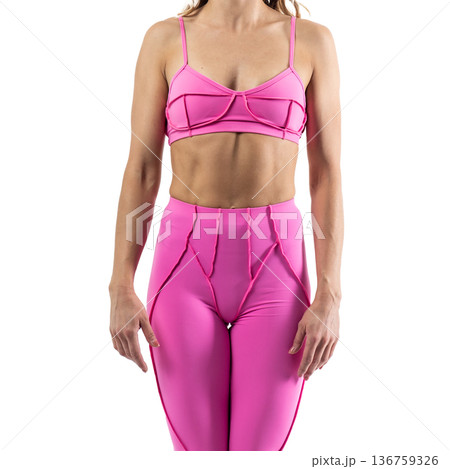 Athletic woman posing in pink sports bra and leggings with transparent background Athletic woman posing in pink sports bra and leggings with transparent background 136759326