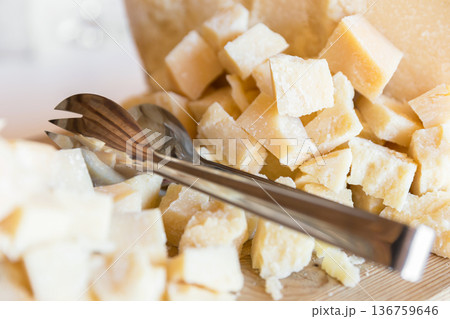 Pieces and cubes of cheese 136759646