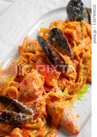 Seafood pasta with mussels and red caviar Seafood pasta with mussels and red caviar 136760010