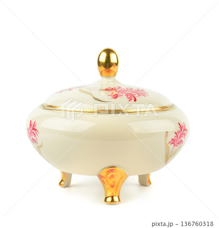 Antique ceramic candy dish with lid featuring elegant gold finish Antique ceramic candy dish with lid featuring elegant gold finish 136760318