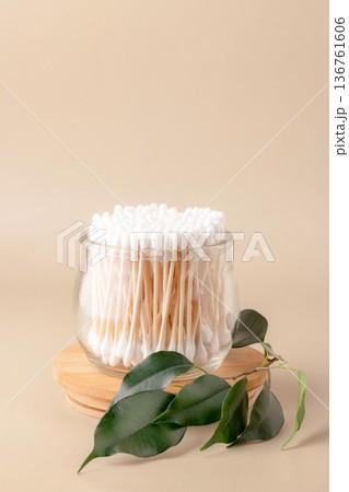 Eco-friendly bathroom essentials, bamboo toothbrushes, cotton swabs, reusable cotton pads, comb, facial brush. Green lifestyle, eco-consciousness 136761606