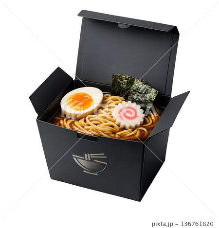 Delicious serving of ramen in a stylish black takeout box, topped with a soft-boiled egg and classic narutomaki fish cake swirls, isolated for food concepts 136761820