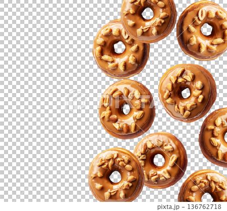 Top view of multiple maple glazed donuts with chopped pecans, isolated on white background, concept of sweet pastry pattern 136762718