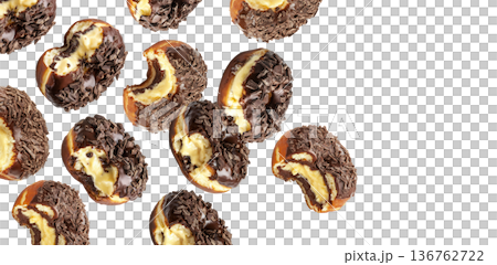 Chocolate glazed cream filled donuts with visible bite marks, isolated on white background. Concept of sweet dessert pattern Chocolate glazed cream filled donuts with visible bite marks, isolated on white background. Concept of sweet dessert pattern 136762722