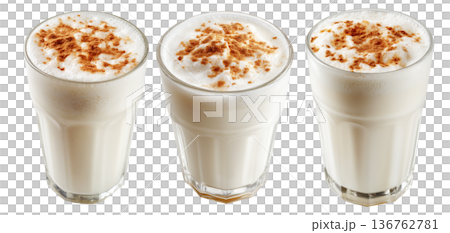 Ayran salted yogurt drink in tall glass with foamy top and cinnamon powder, isolated on white background, concept of healthy drink 136762781