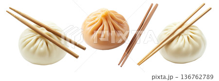Chinese steamed buns Char Siu Bao filled with savory mushroom pieces isolated on white background Chinese steamed buns Char Siu Bao filled with savory mushroom pieces isolated on white background 136762789