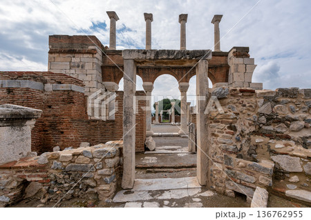 Ancient Basilica of St John ruins with columns and arches under a cloudy sky in Selcuk Izmir Province Turkey Ancient Basilica of St John ruins with columns and arches under a cloudy sky in Selcuk Izmir Province Turkey 136762955
