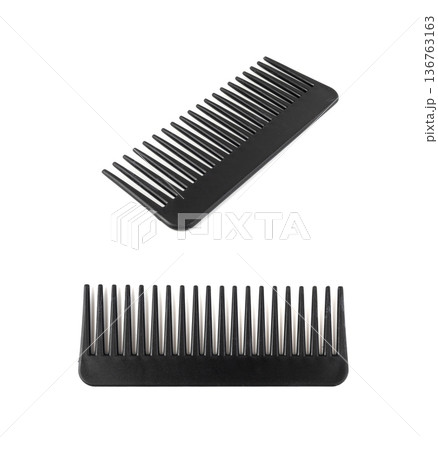 Black plastic comb isolated 136763163