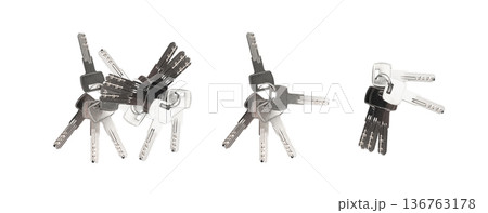 Keys and lock cylinder for door lock isolated. Pin tumbler components ready to replace or repair 136763178